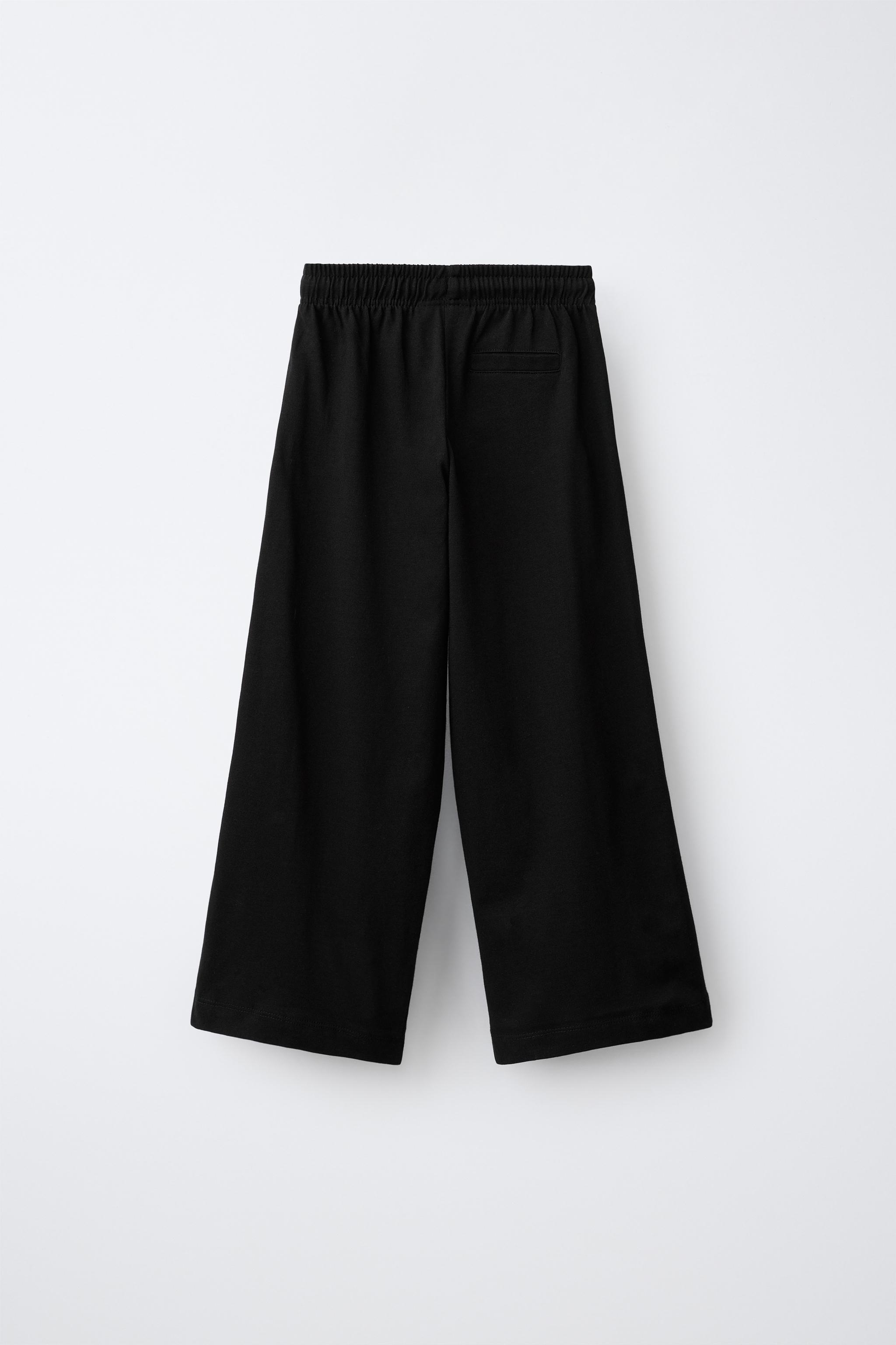WIDE LEG PANTS WITH SIDE STRIPES