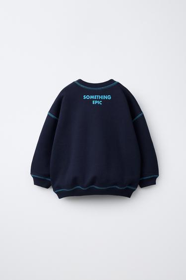 SWEAT À INSCRIPTION ET SURPIQÛRES EN CONTRASTE - Bleu marine de Zara - Image 1