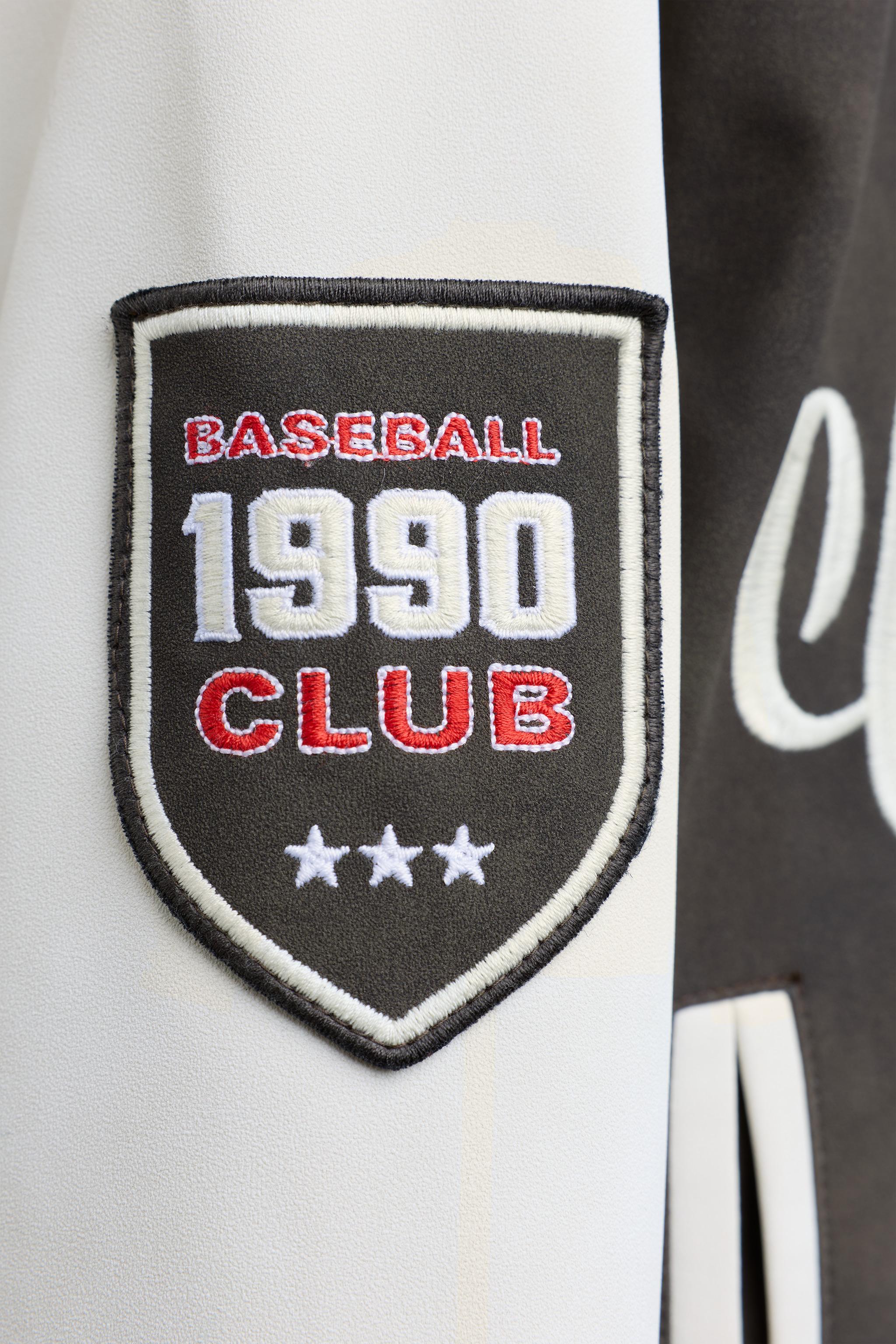 BLOUSON BOMBER À CAPUCHE MATIÈRE SYNTHÉTIQUE