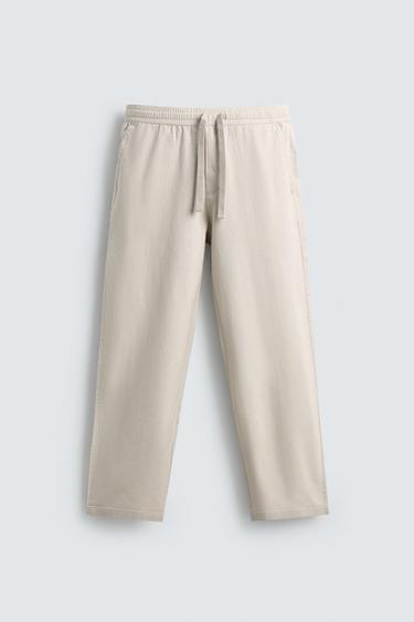 بنطلون RELAXED FIT قطن - كتان - رمادي لؤلؤي الخاص بـ Zara