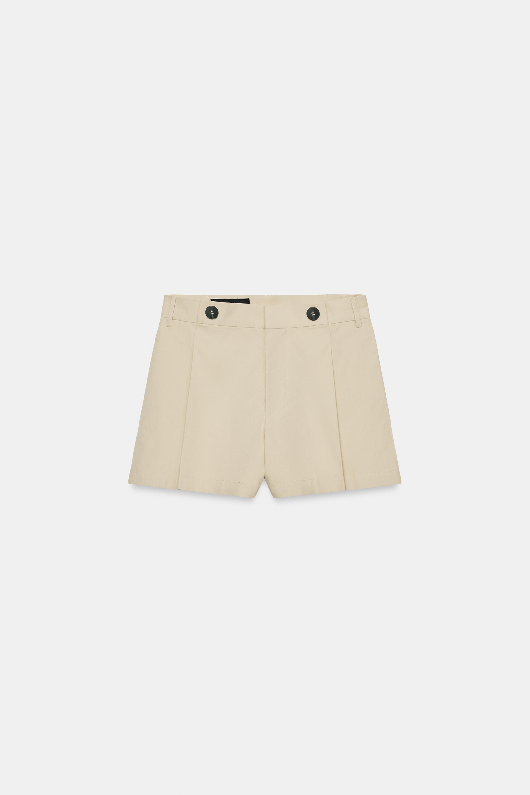 PLEATED BUTTON SHORTS