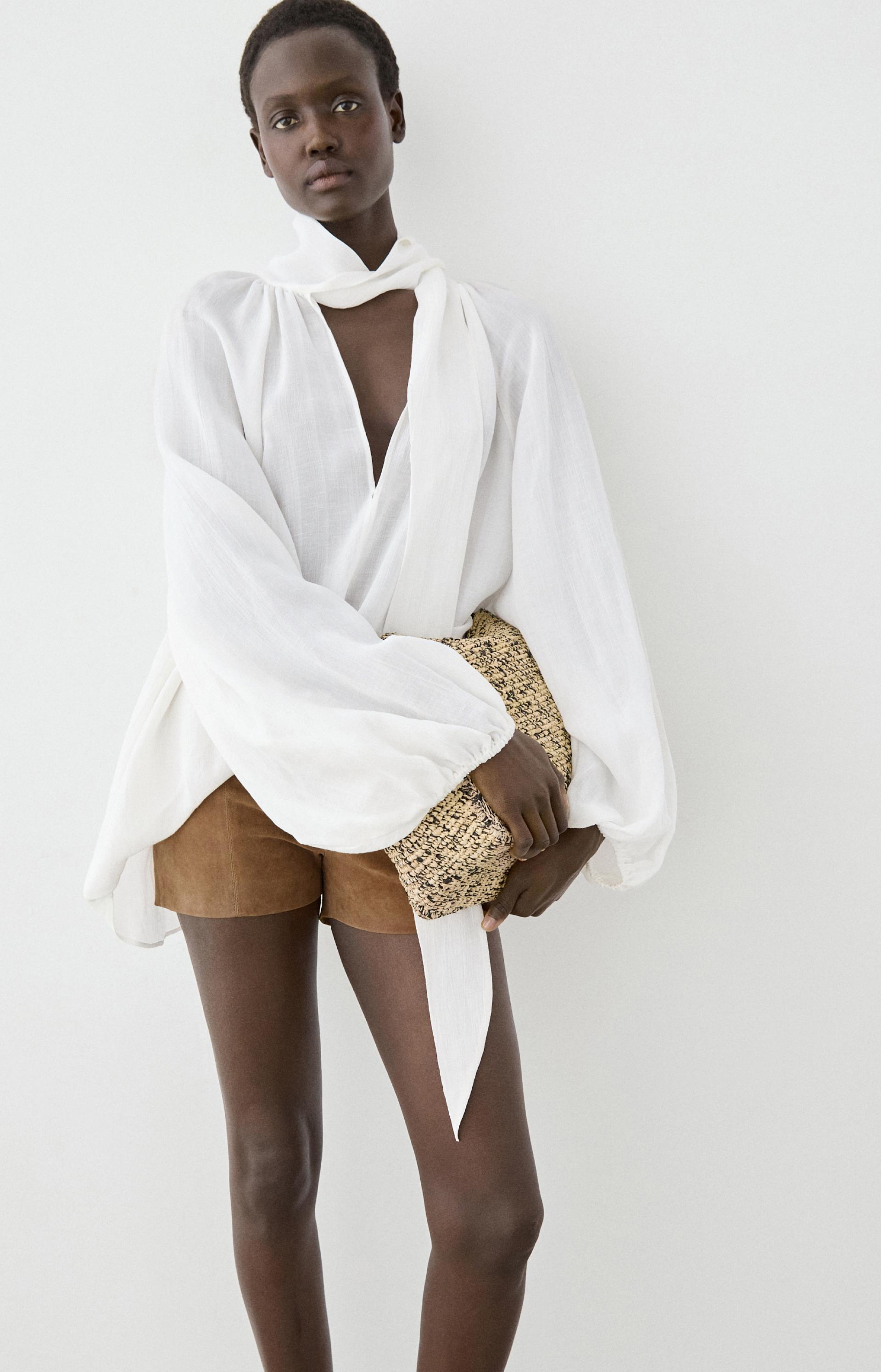 Flowing V-neck blouse with tie — White