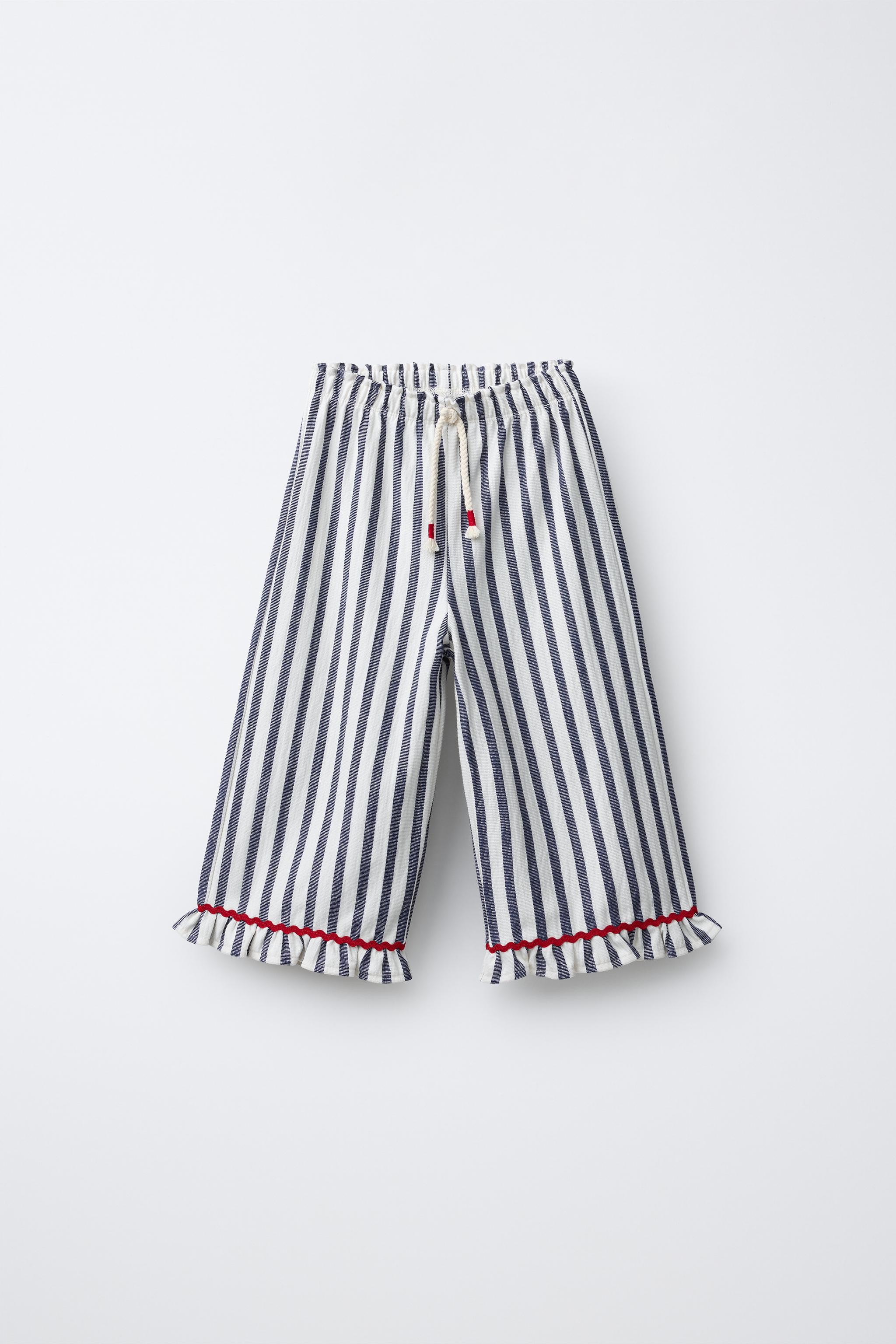 PANTALON À RAYURES TISSÉES ET VOLANTS
