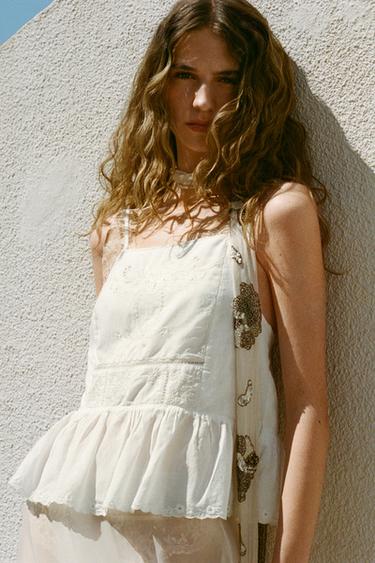 TOP FLORES BORDADAS LAZADA - Blanco roto de Zara