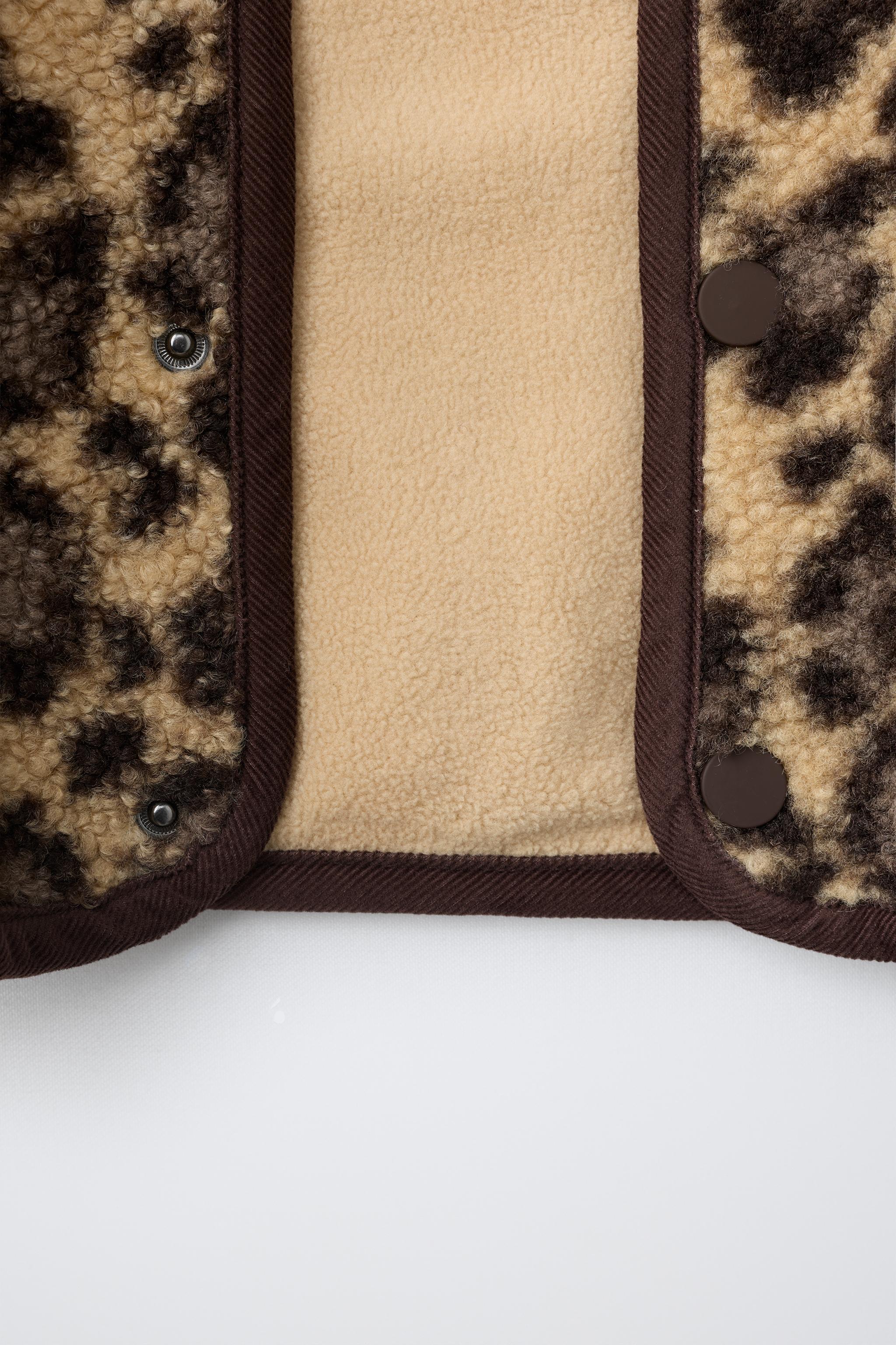 BLOUSON ANIMAL PRINT EN BORREGUILLO