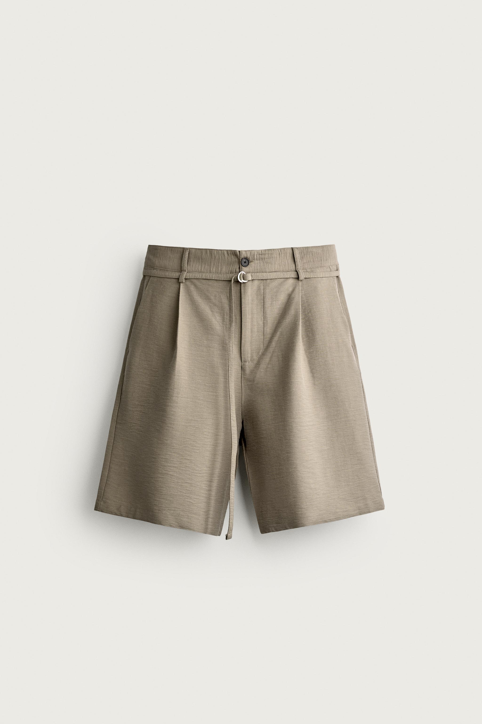 RELAXED FIT PLEATED BELTED SHORTS — camel