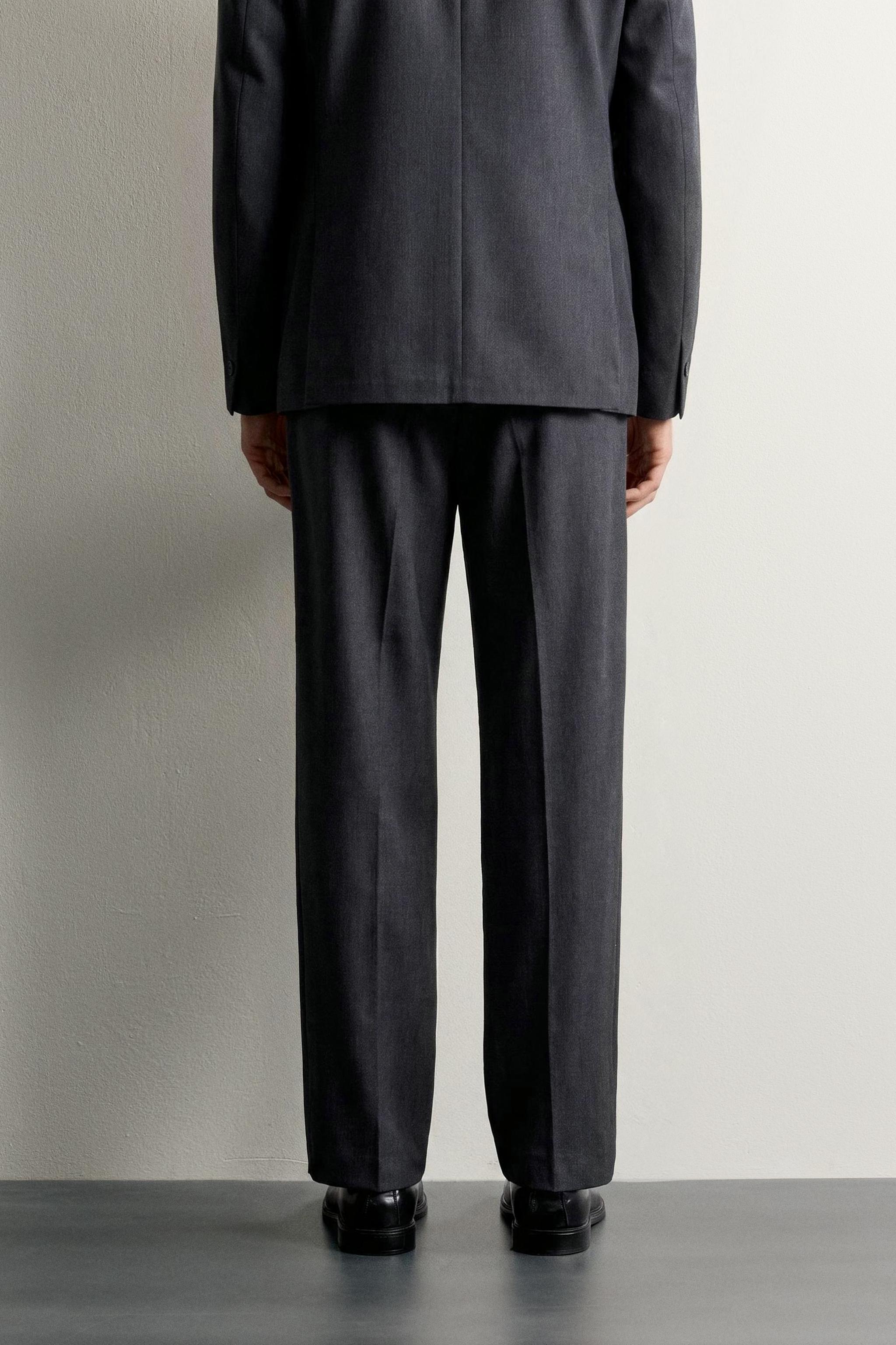 REGULAR FIT PLEATED SUIT PANTS