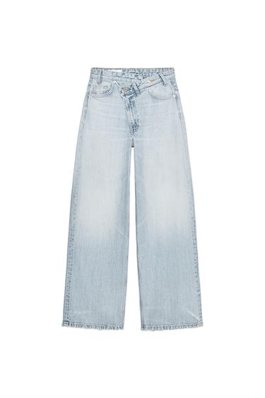 Front view of wide-leg jeans in light blue denim with front and back pockets.