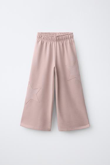 CALÇAS DE PERNA LARGA COM APLIQUES DE ESTRELAS - Rosa da Zara - Imagem 0
