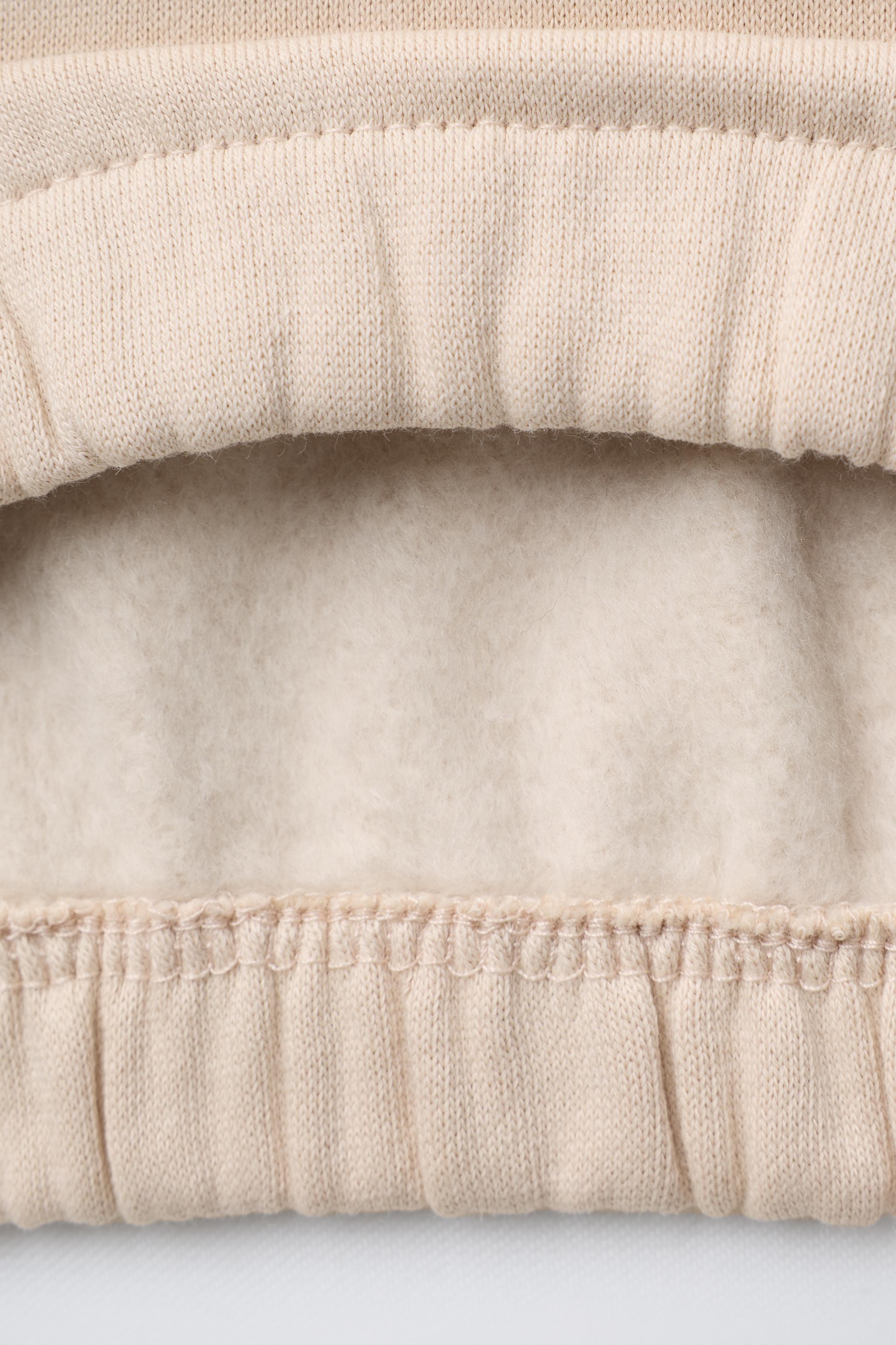 CONTRAST EMBROIDERED SWEATSHIRT