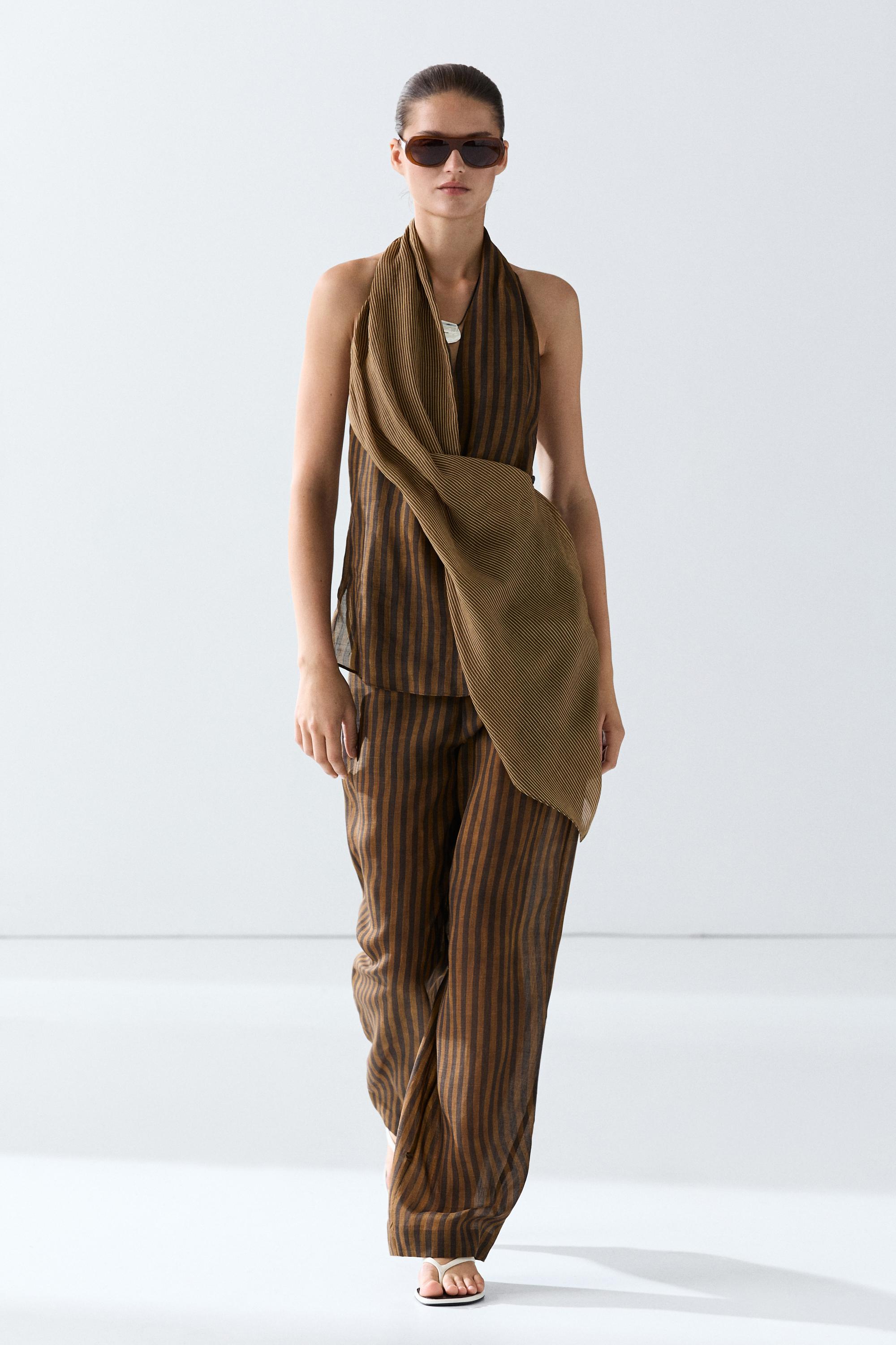 Total look flowing striped pants with button hem — Dark khaki