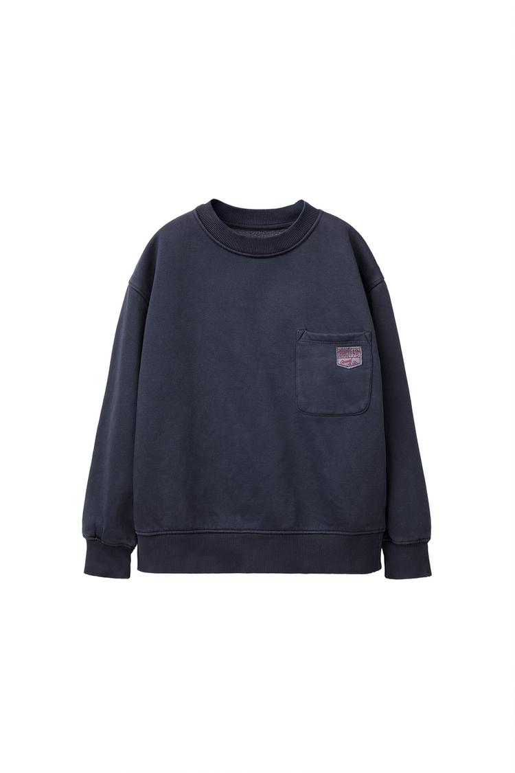 SUDADERA LISA BOLSILLO ETIQUETA