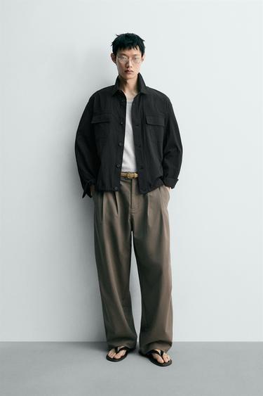 PANTALÓN FLUIDO PLIEGUES - Marrón de Zara - Imagen 0