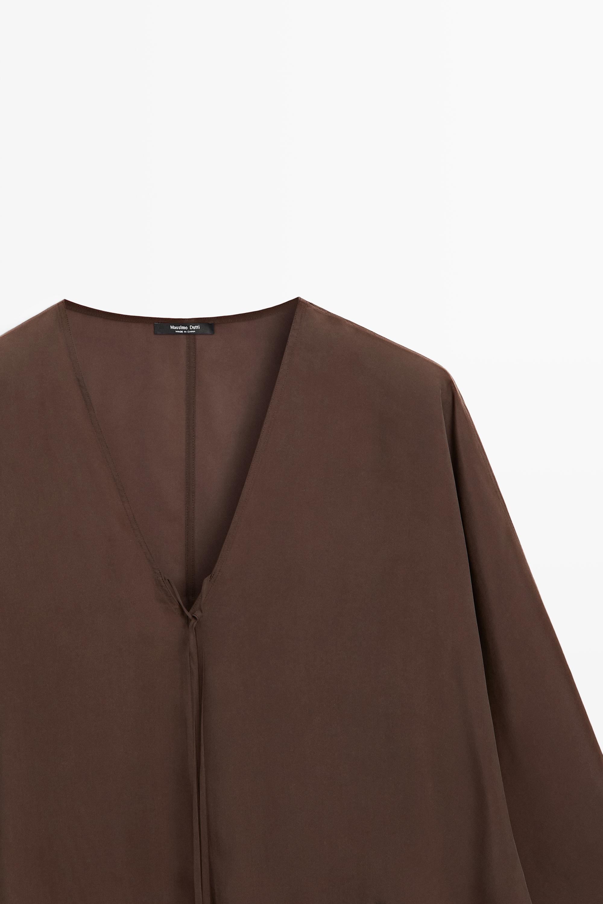 Blouse fluide col en V à nouer