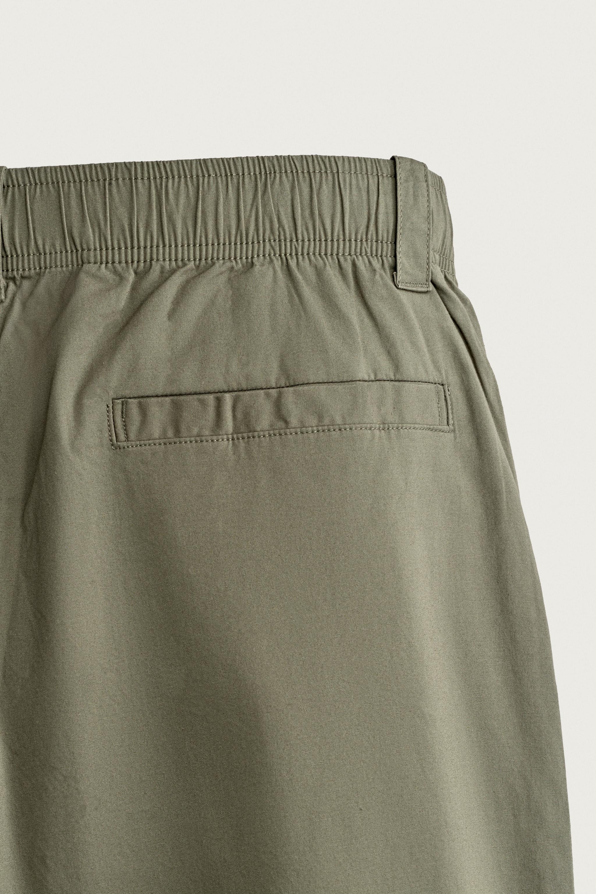 RELAXED FIT PLEATED JOGGER PANTS