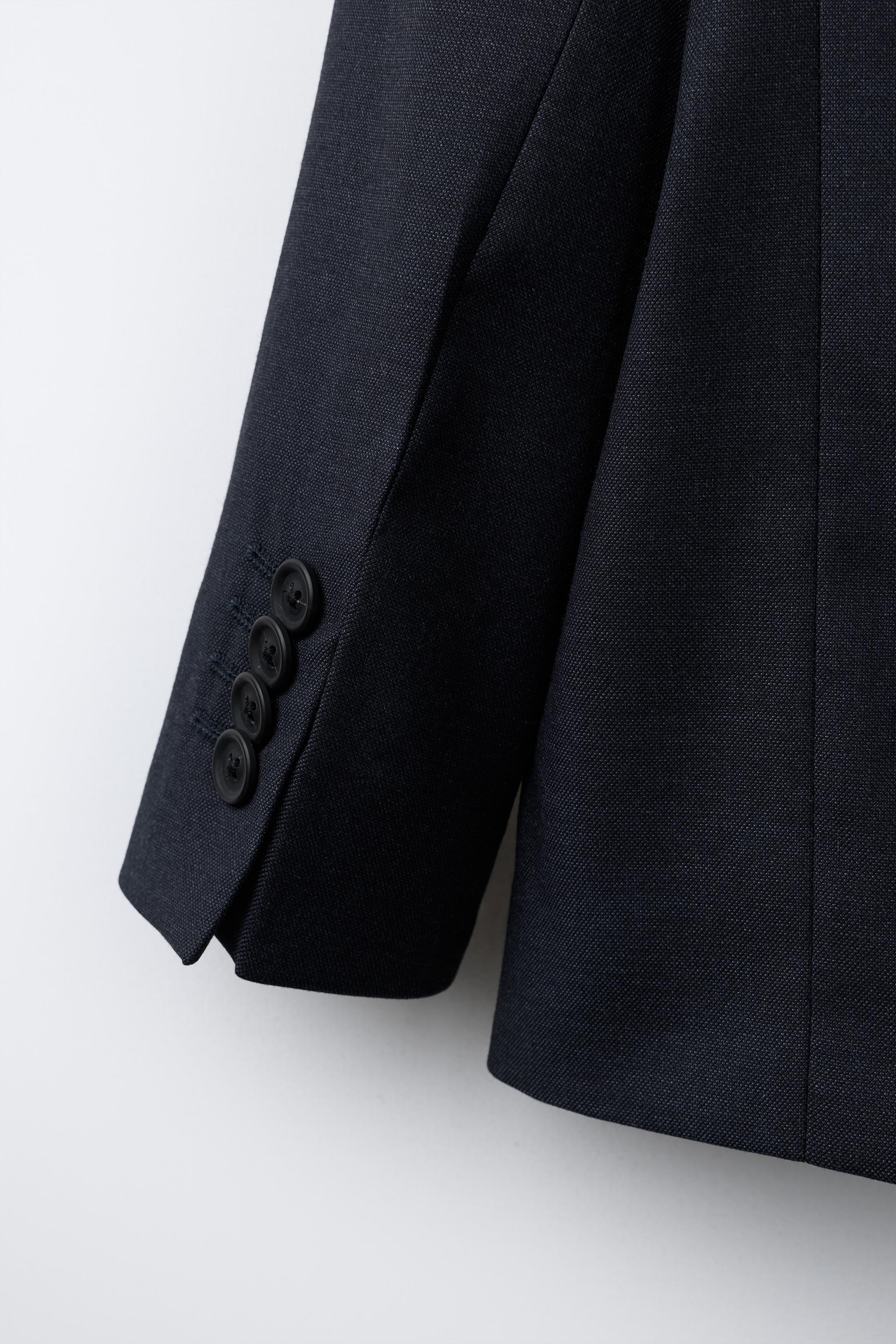 TEXTURED SUIT BLAZER