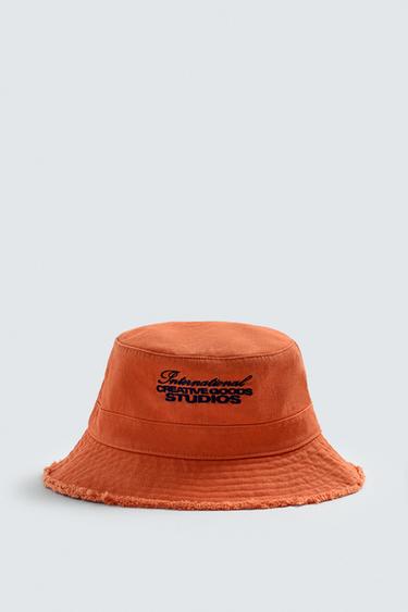 KATOENEN REGENHOED - Oranje van Zara