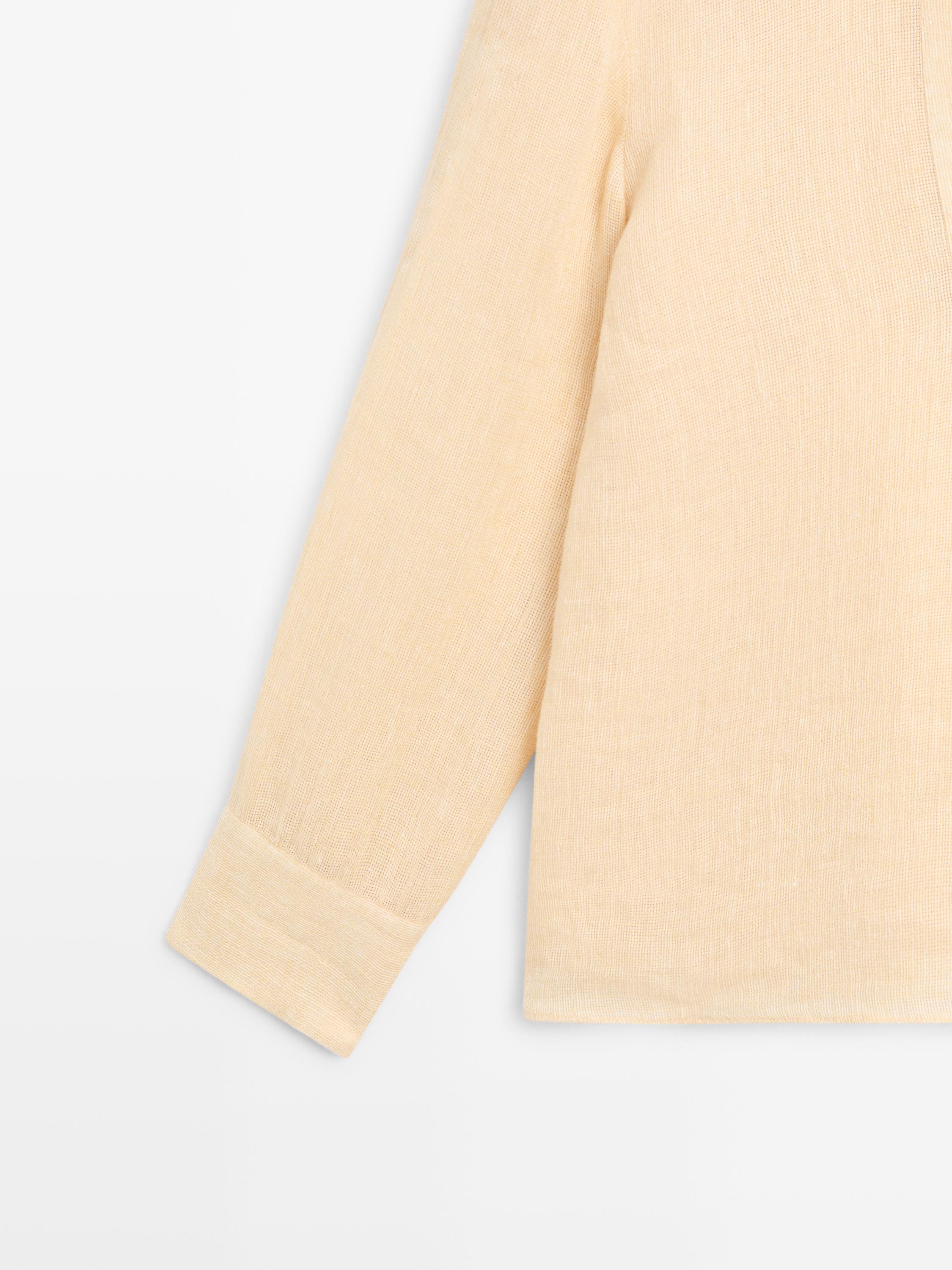 Flowing linen blouse with chest detail