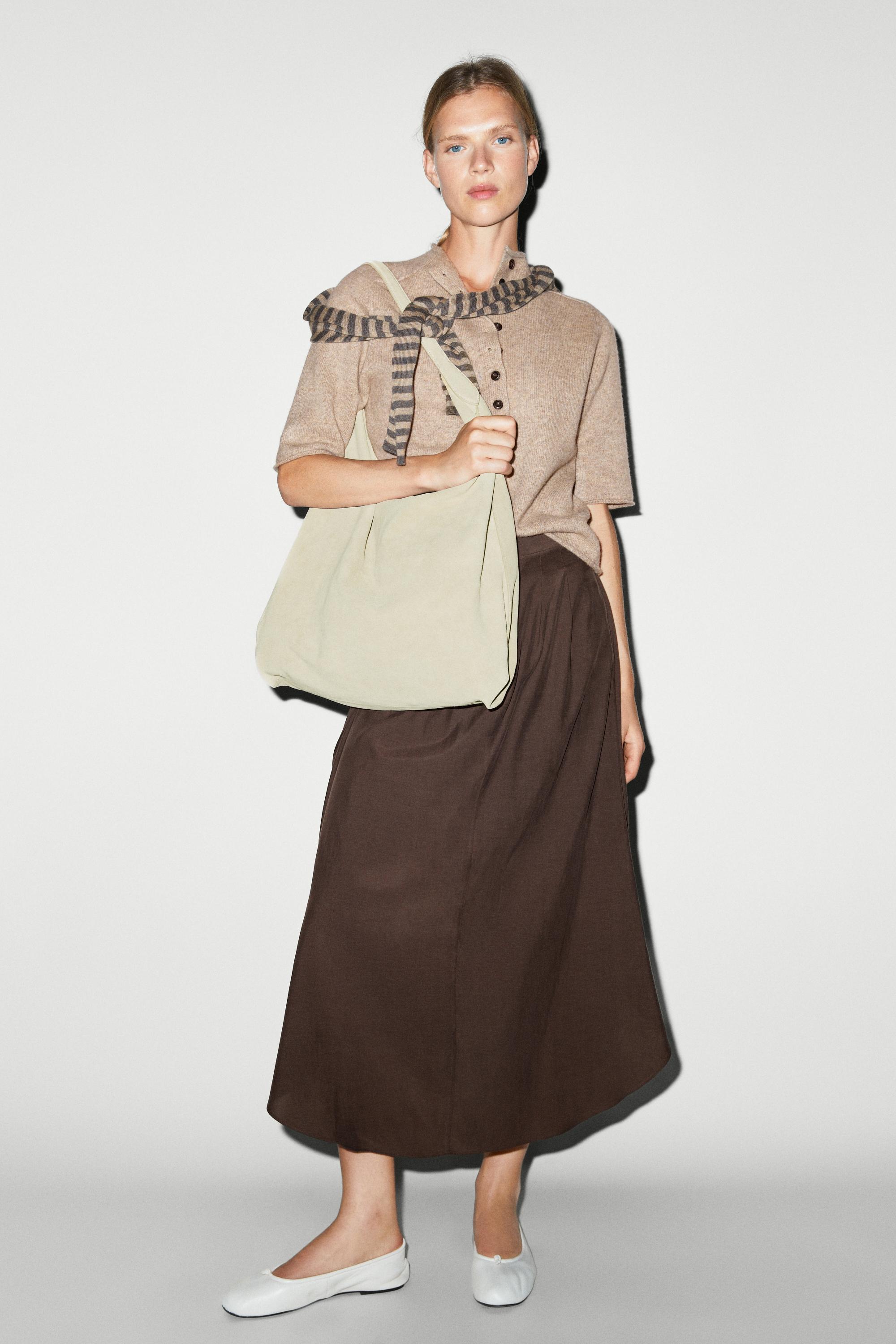 Flowing pleated midi skirt
