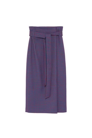 Front view of a blue skirt with a belt and a small checkered print.