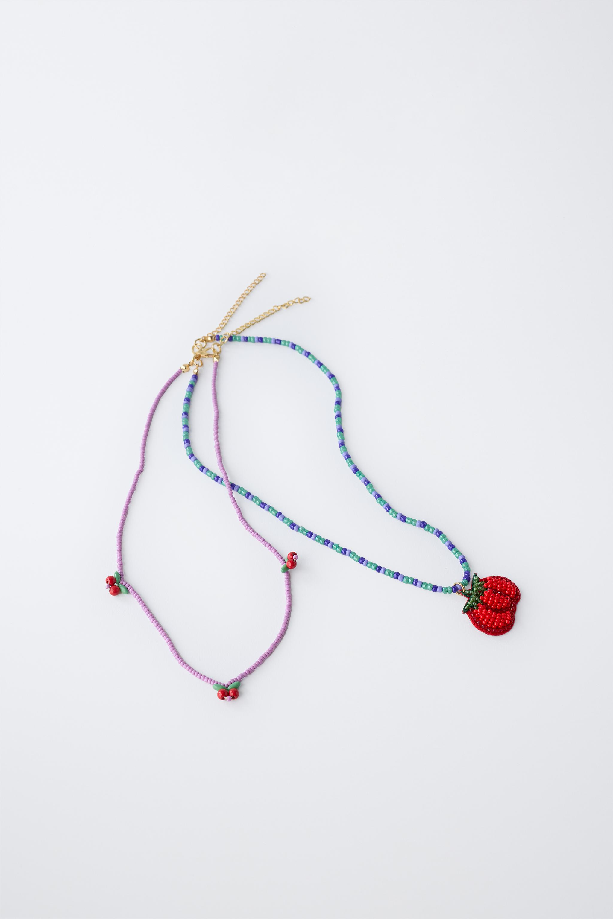 LOT DE DEUX COLLIERS FANTAISIE TOMATE