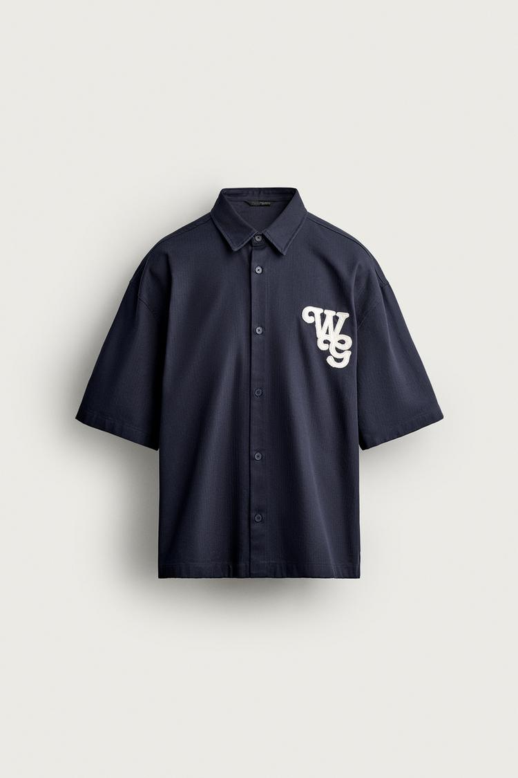 Camisa relaxed fit espiga parches