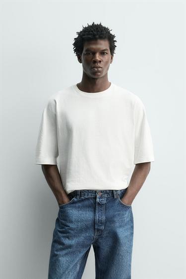 OPRANÉ TRIČKO REGULAR FIT - Špinavě bílá od Zara