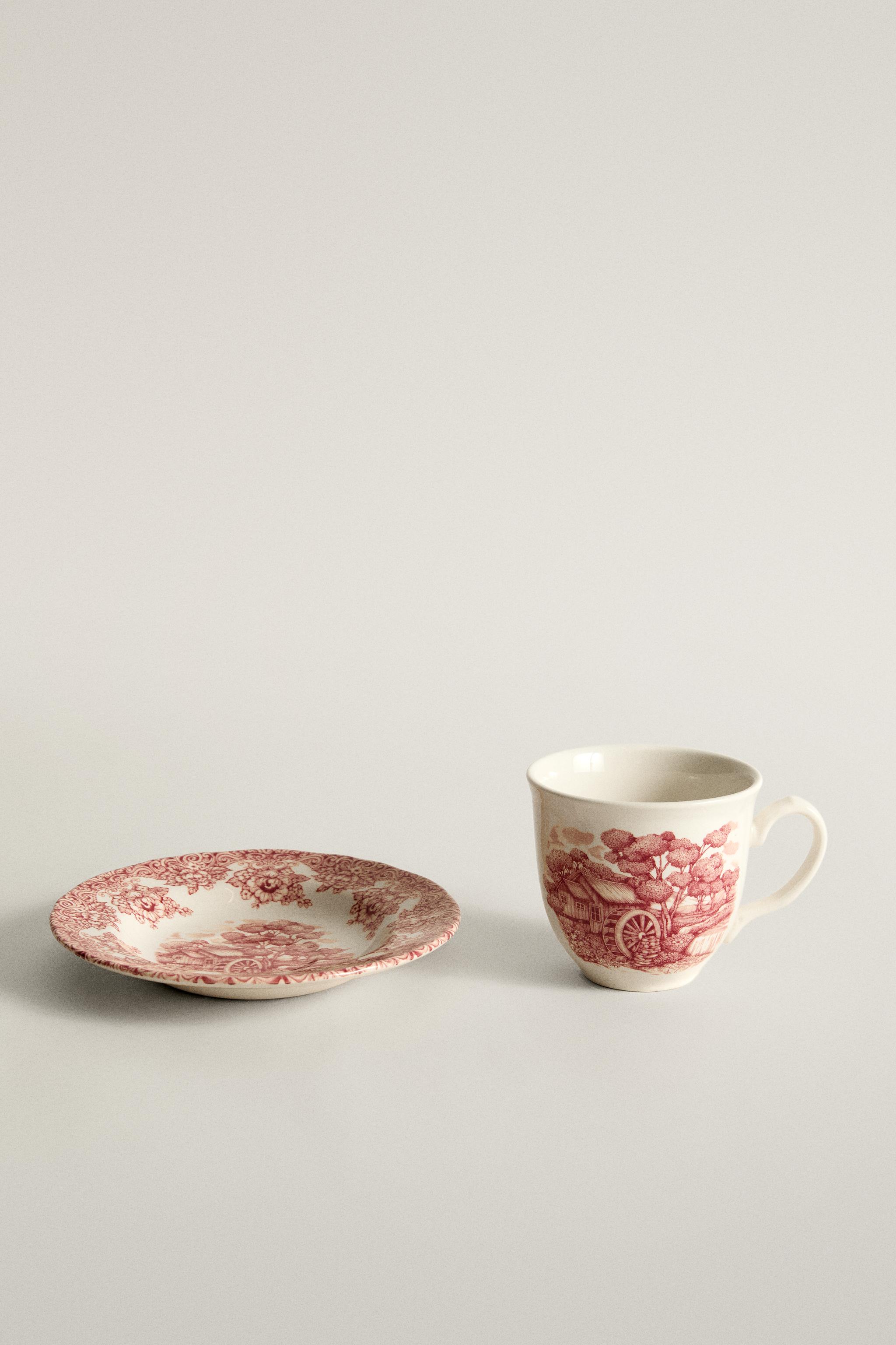FLORAL AND LANDSCAPE EARTHENWARE COFFEE CUP AND SAUCER