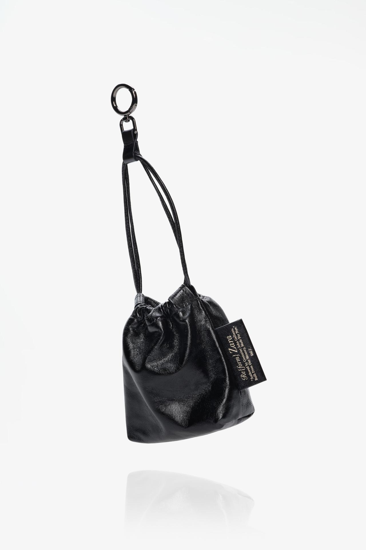 LIMITED EDITION TRI-CHIC LEATHER CHARM — Black