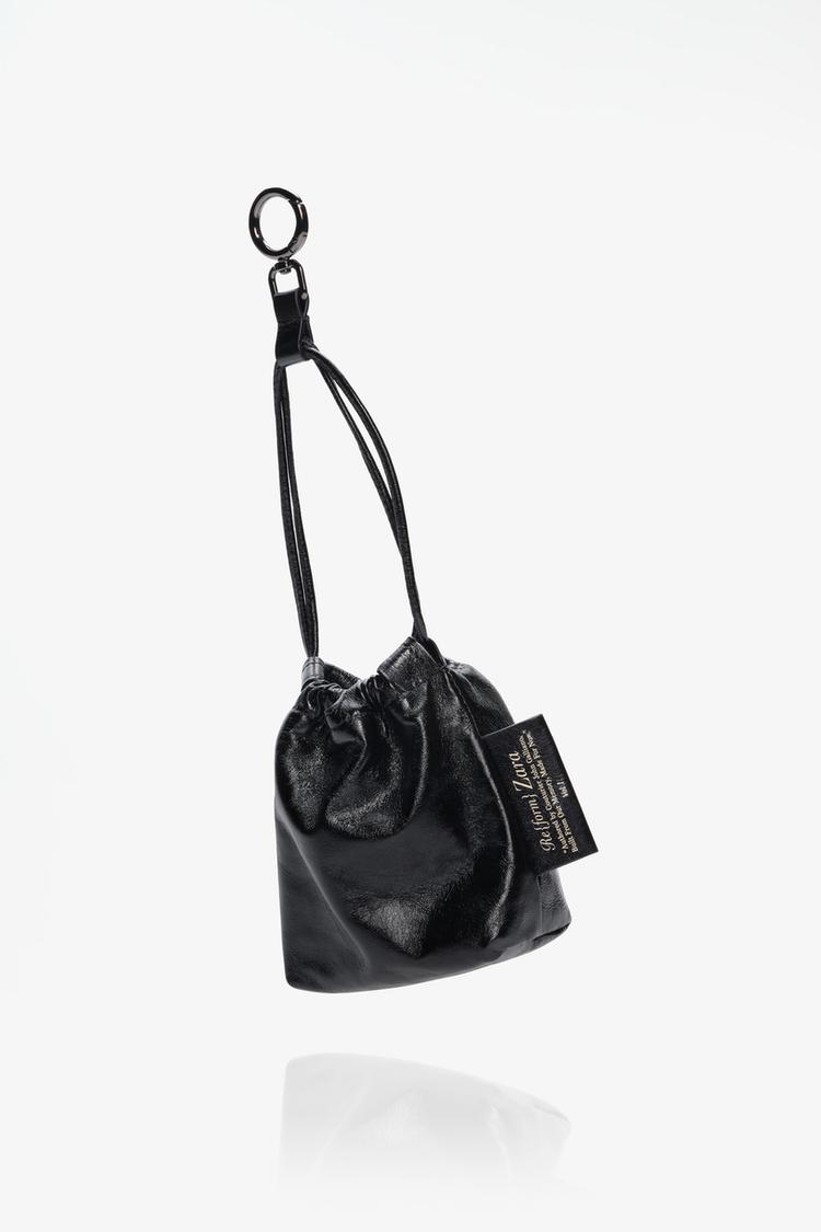 LIMITED EDITION TRI-CHIC LEATHER CHARM — Black