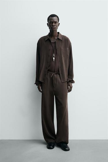 RELAXED FIT FLOWING TROUSERS - Brown by Zara