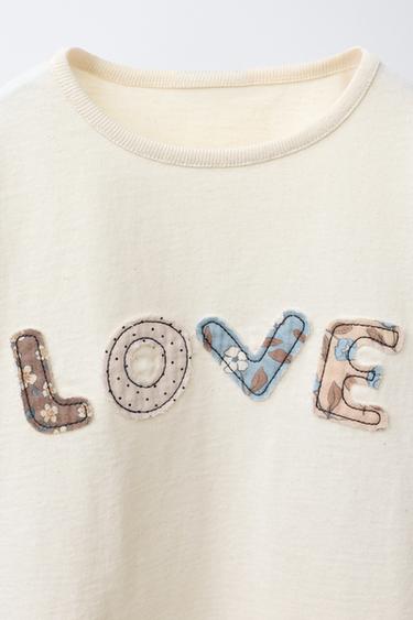 T-SHIRT AVEC INSCRIPTION ET PIÈCES - Écru de Zara - Image 2
