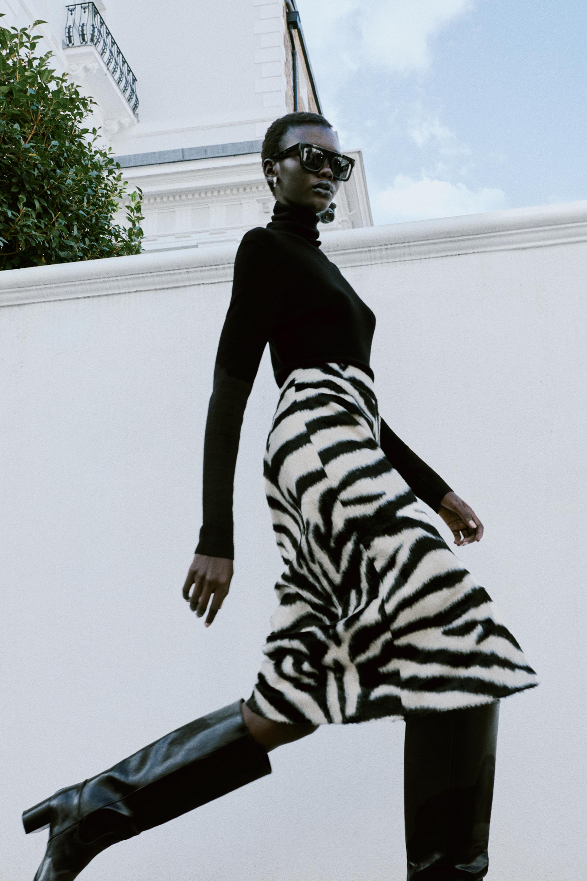 ANIMAL PRINT FAUX FUR MIDI SKIRT