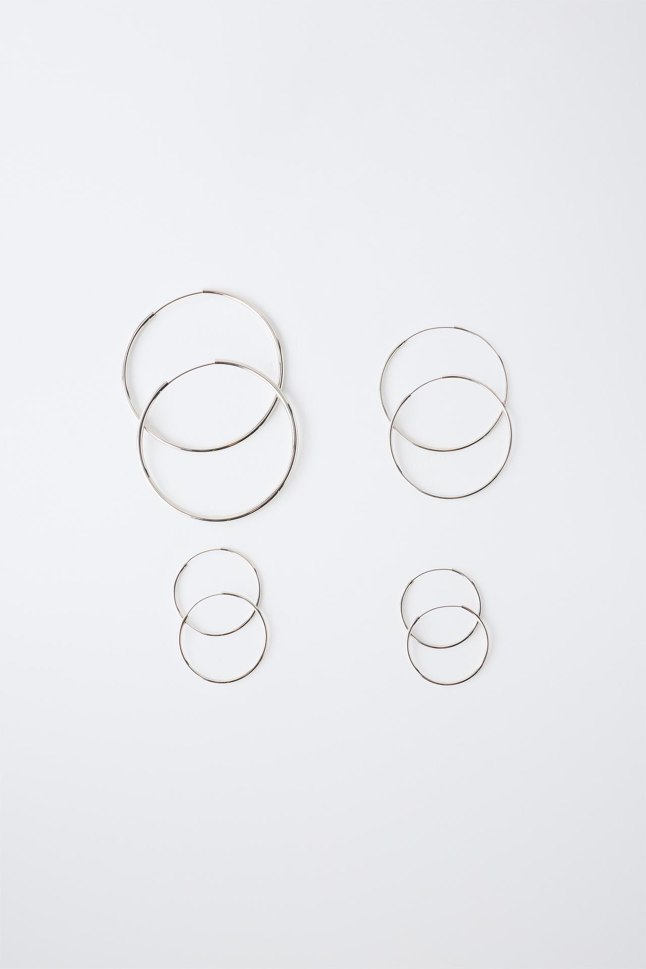 FOUR-PACK OF HOOP EARRINGS — Silver