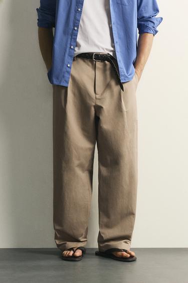 RELAXED FIT PLEATED TROUSERS - Beige by Zara