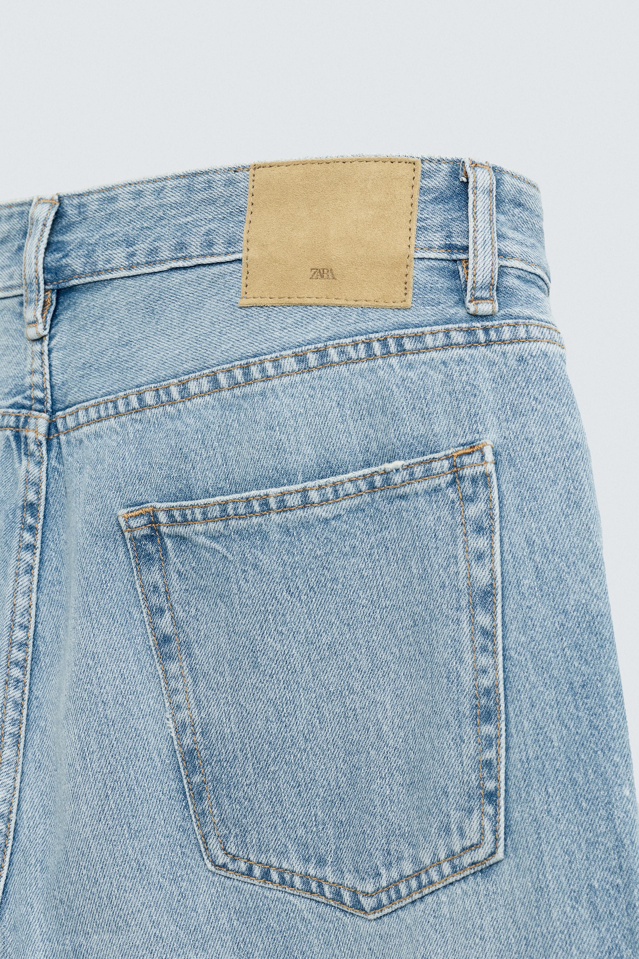 SLIM TAPERED FIT JEANS