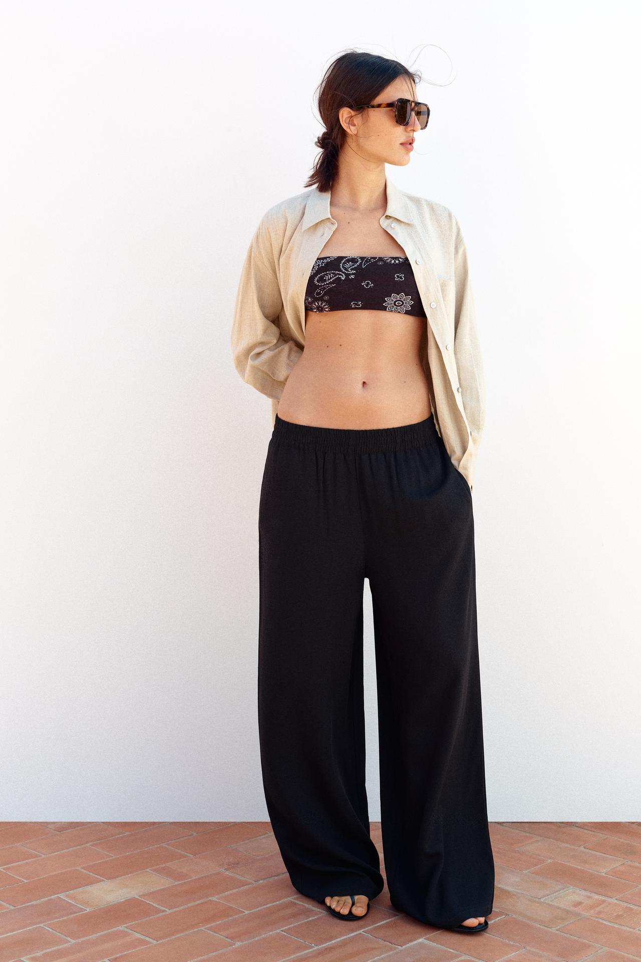 WIDE-LEG TROUSERS WITH ELASTIC WAISTBAND - Black by Zara
