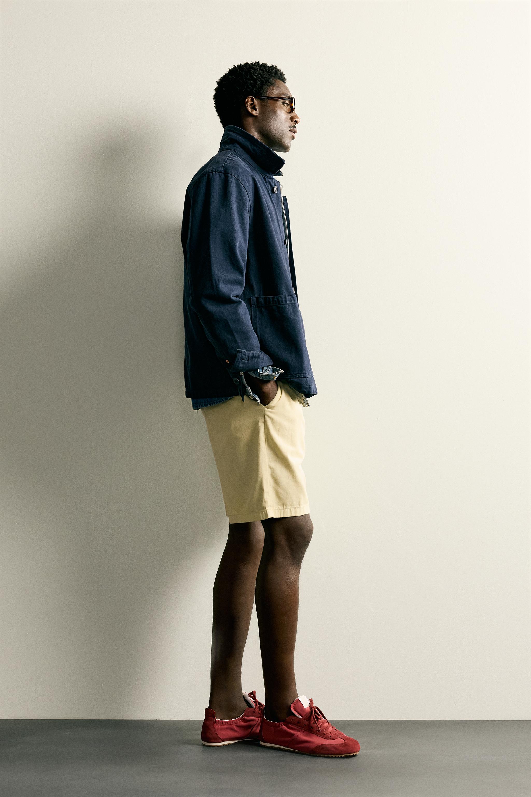 REGULAR FIT PLEATED BERMUDA SHORTS