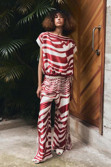 PANTALÓN SATINADO ESTAMPADO LAZOS ZW COLLECTION - burdeos/crudo de Zara