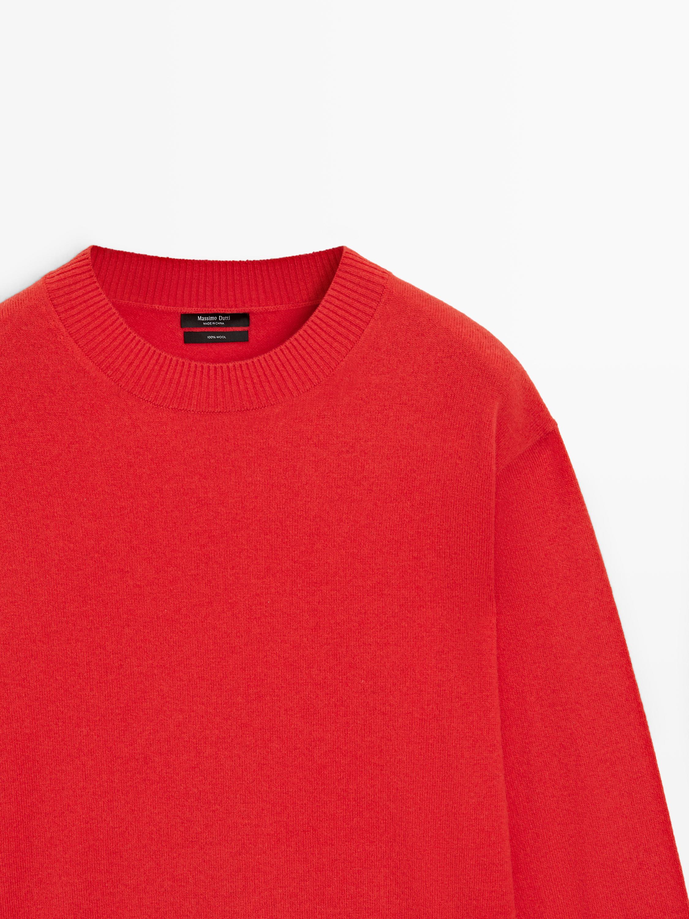 100% wool knit sweater with waist detail