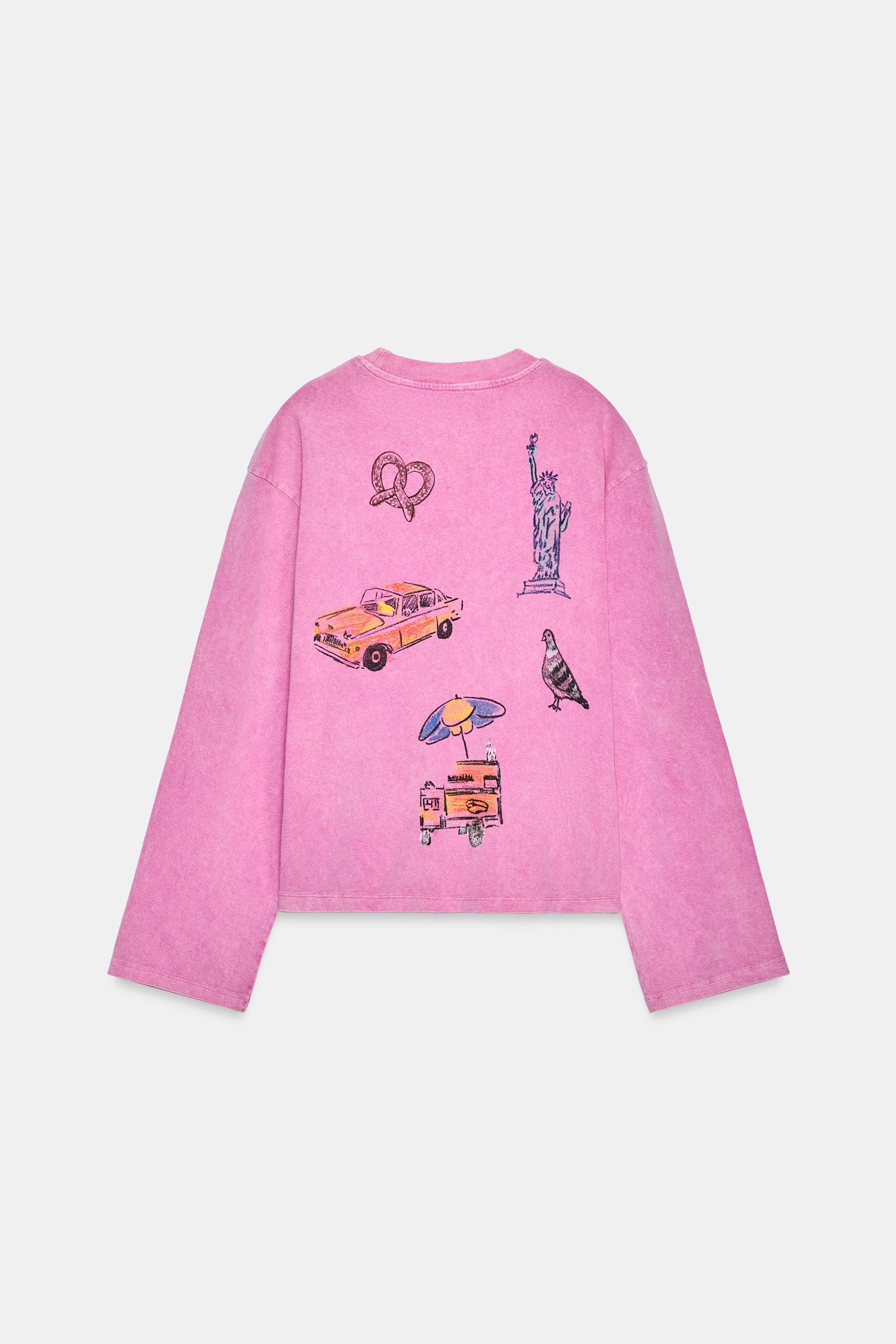 T-SHIRT EFFET DÉLAVÉ À DESSINS