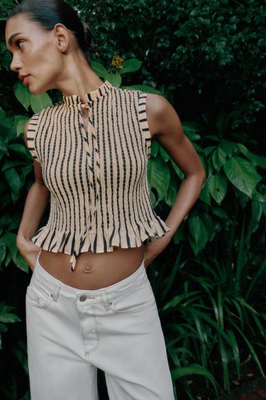 TOP DE RATLLES NIU D'ABELLA - Cru / Negre de Zara