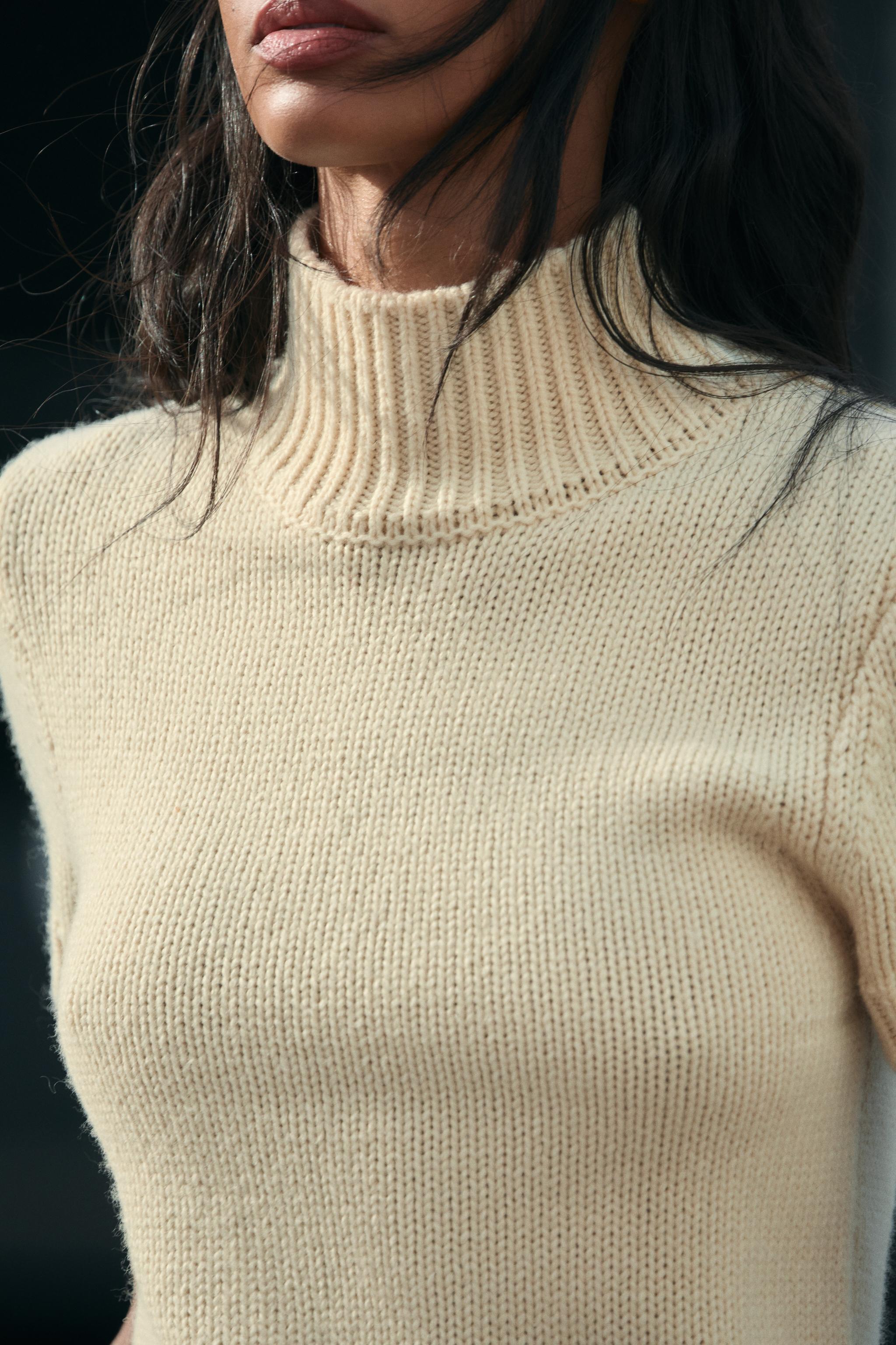 SHORT SLEEVE KNIT SWEATER