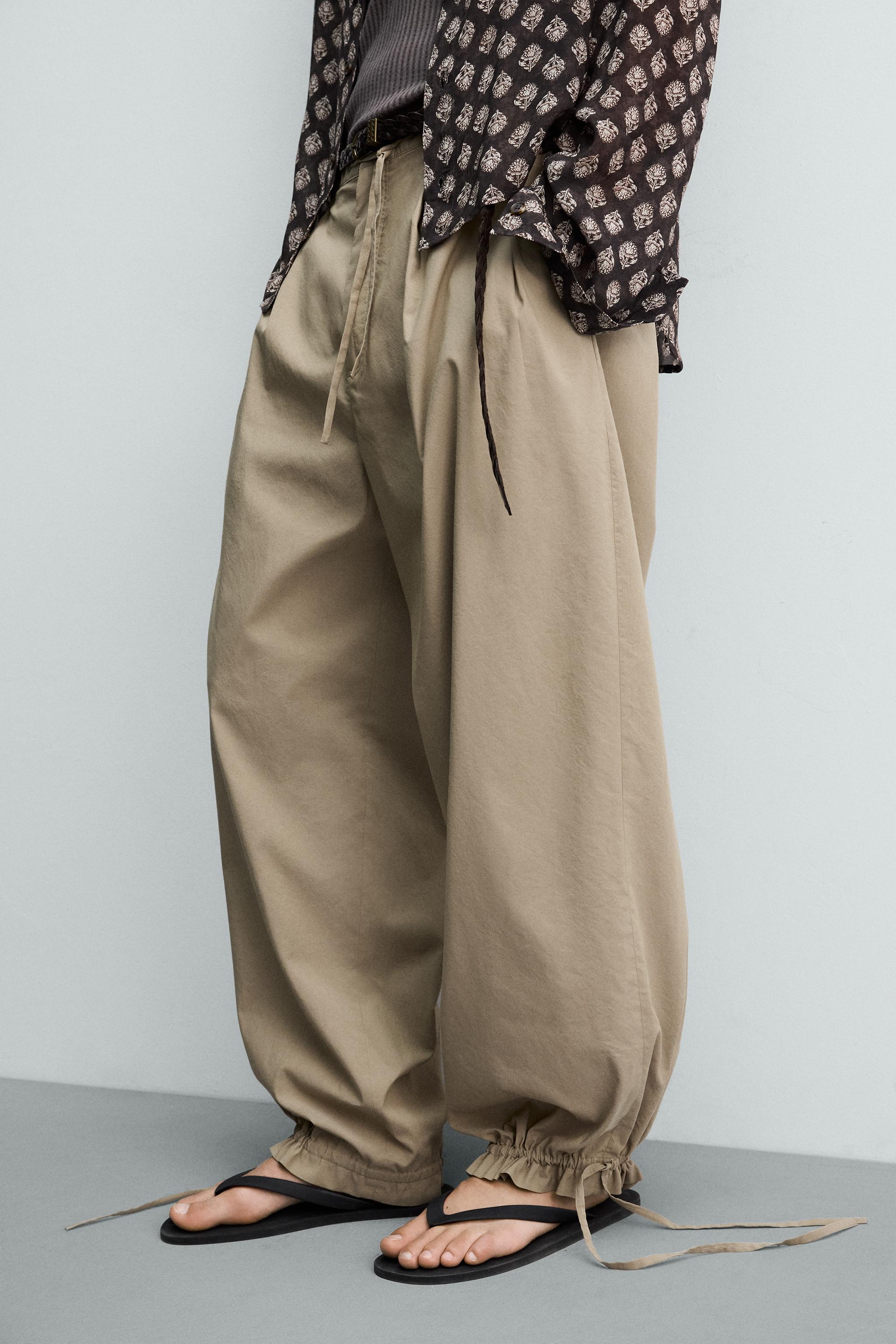 BALLOON FIT PLEATED PANTS