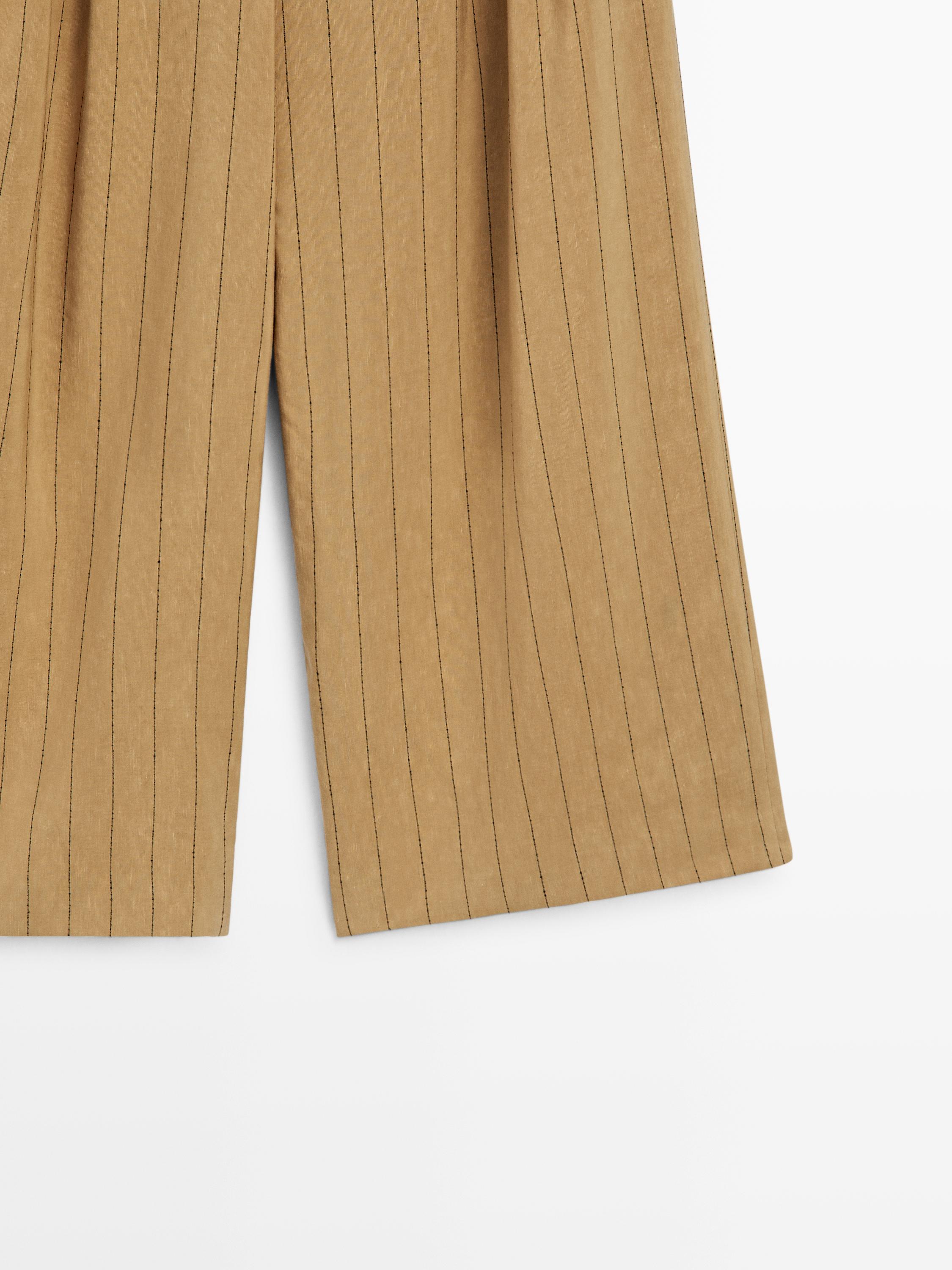Pantalon wide leg à pinces