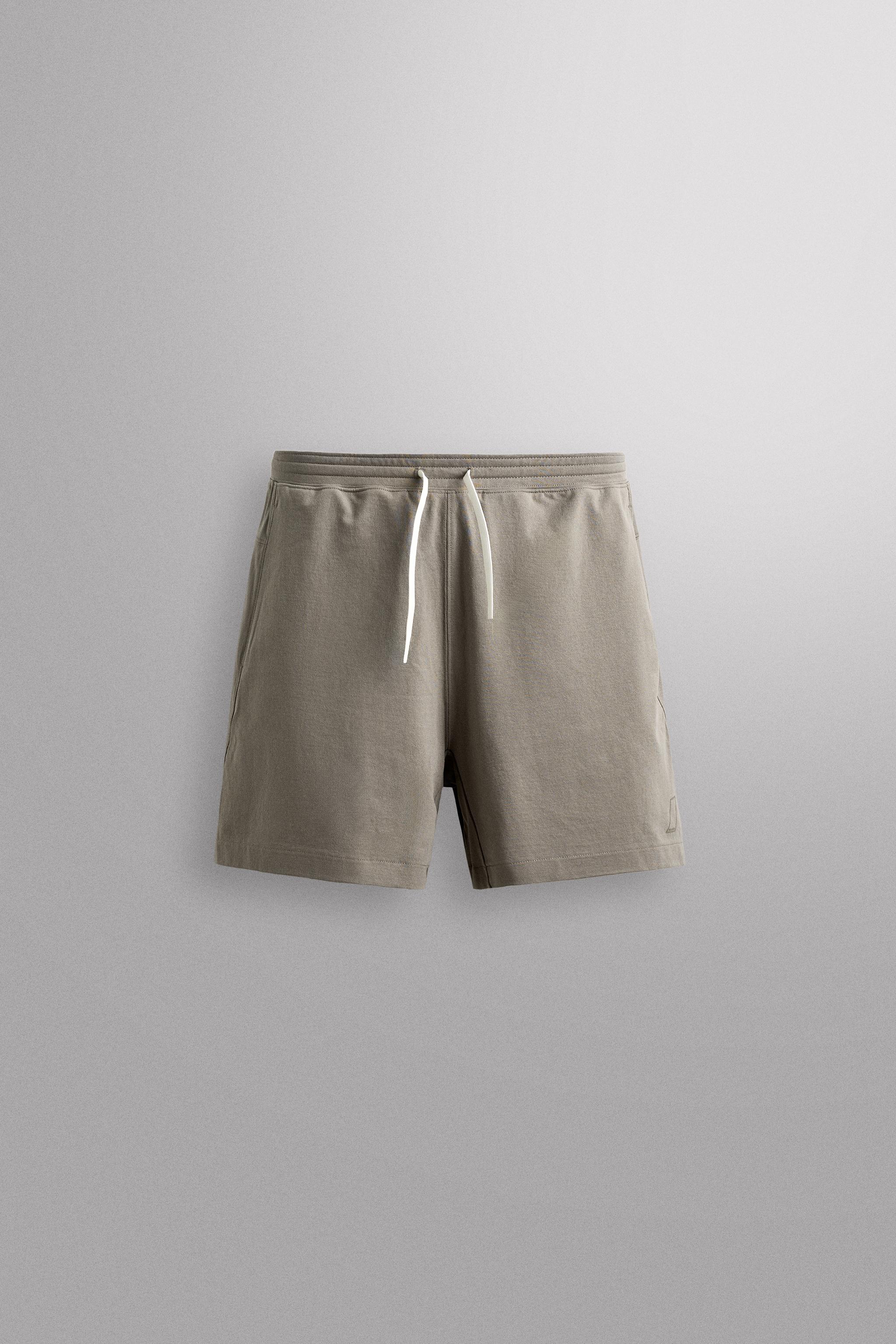 9" COTTON BLEND TRAINING SHORTS — Stone