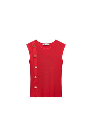 Front view of a sleeveless red top with gold buttons on the side.