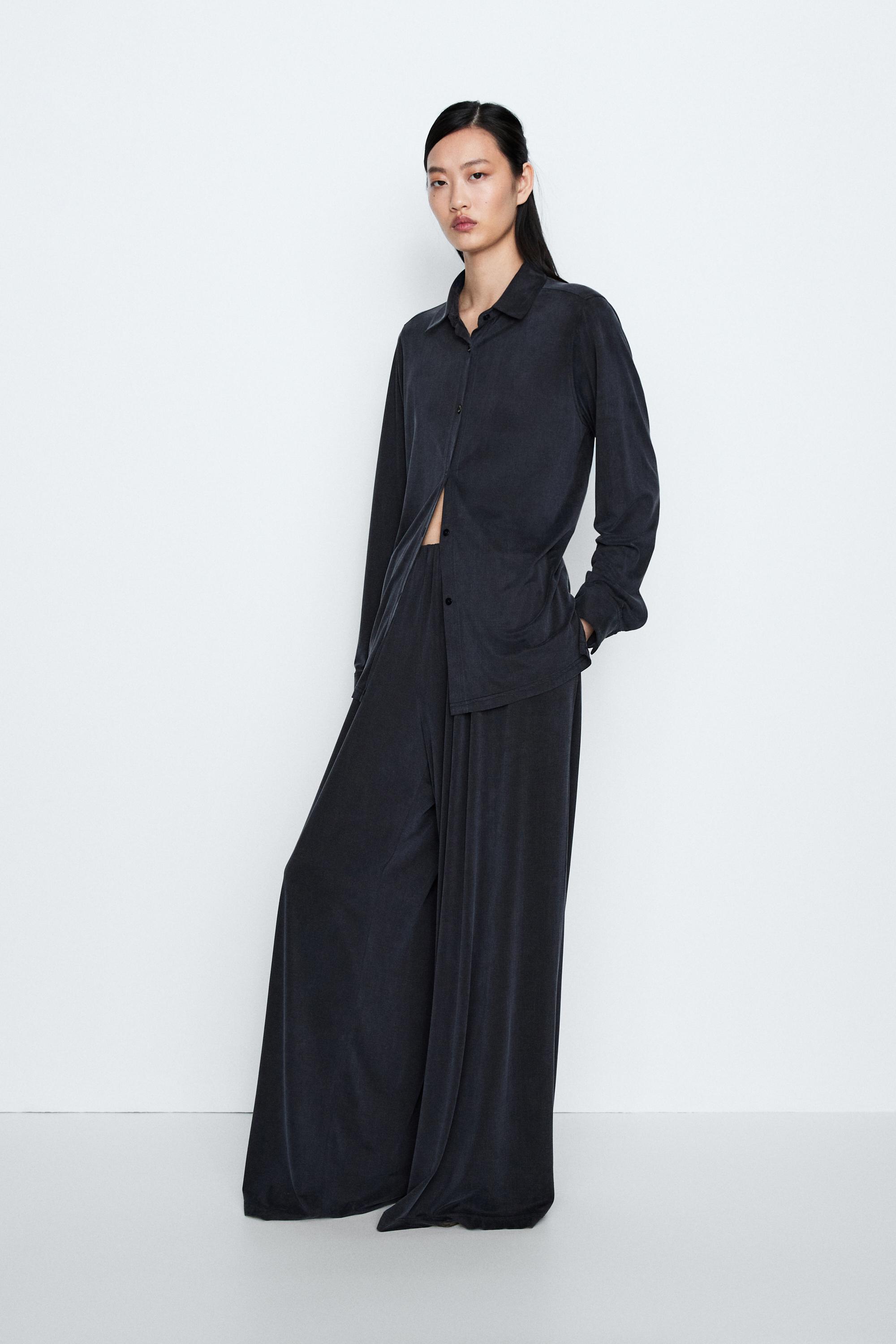 Pleated flowing wide-leg pants - STUDIO — Blue