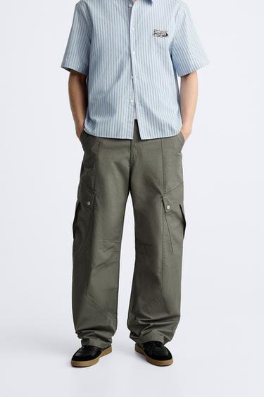 See-through Pants with cargo-patch print