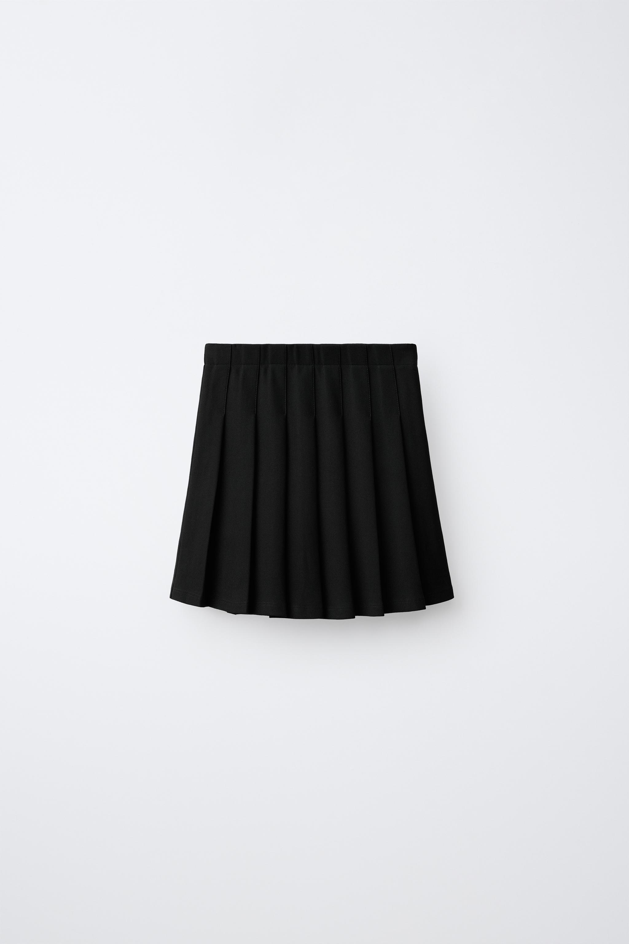 SOLID PLEATED SKIRT